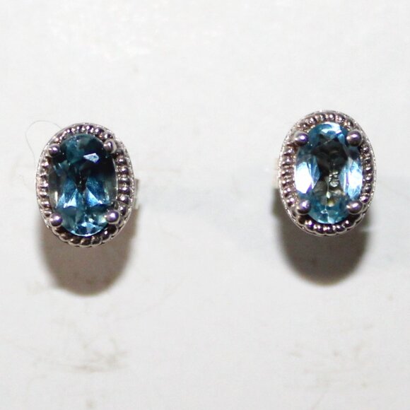 Sterling Silver Blue Topaz Stud Earrings - Picture 1 of 4
